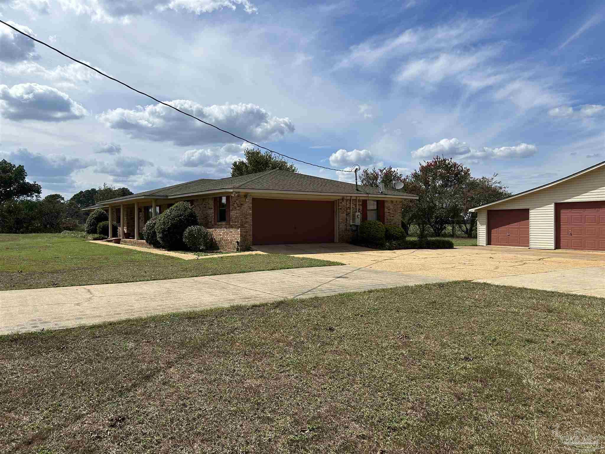 2374 Harvest Road Jay, FL 32565 - Photo 2 of 25 SIDE ENTRANCE GARAGE