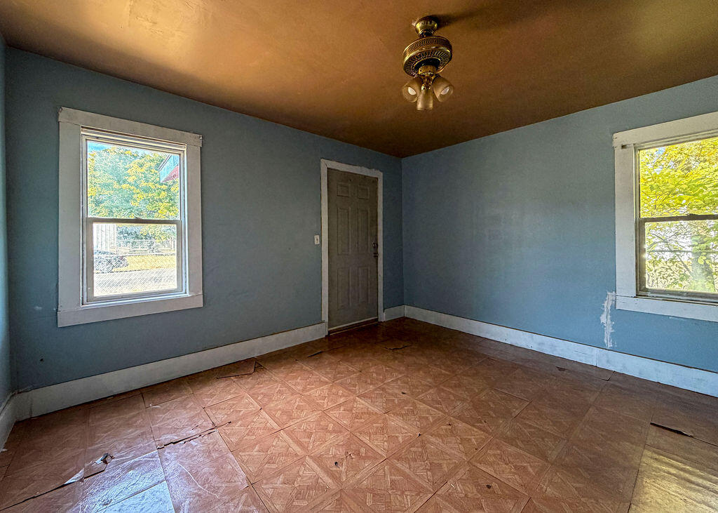 1204 Galveston Plainview, TX 79072 - Photo 4 of 12 a view of an empty room with a window