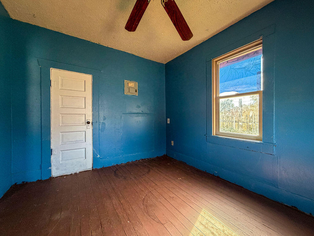1204 Galveston Plainview, TX 79072 - Photo 6 of 12 a view of empty room with window