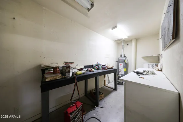 a view of a workspace with furniture