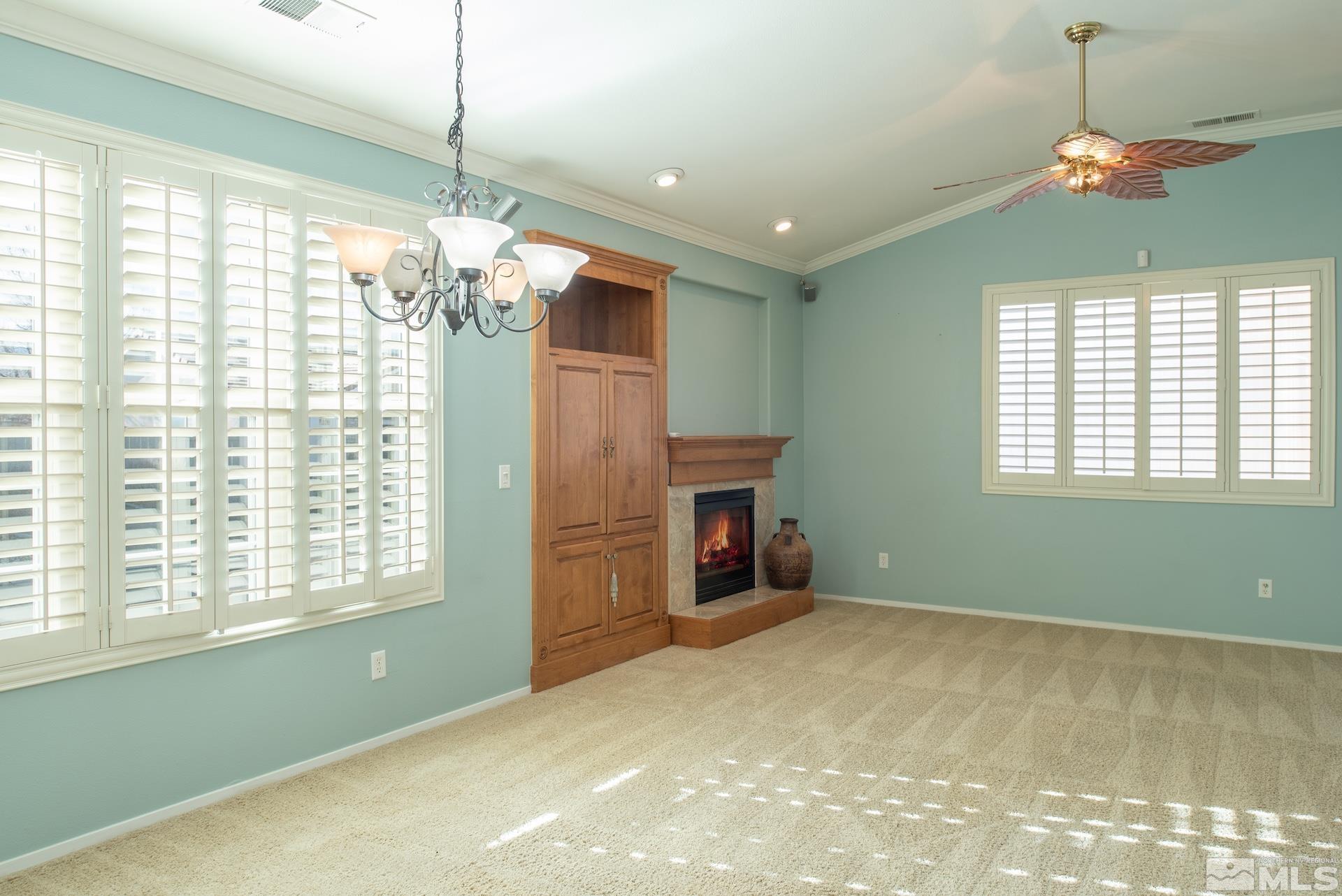 10175 Donner Peak Drive Reno, NV 89521 - Photo 12 of 35 a view of a livingroom with a chandelier
