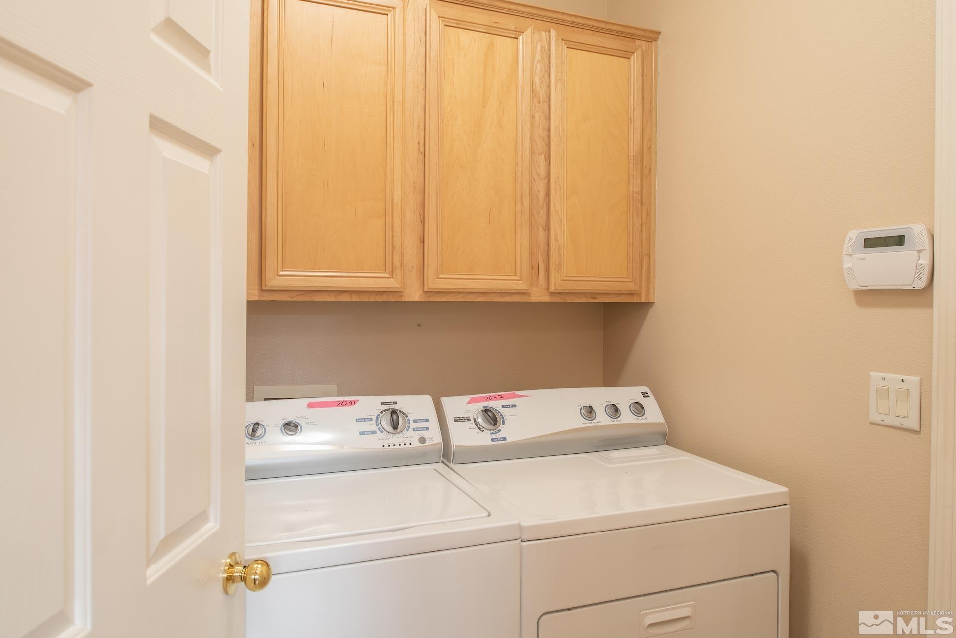 10175 Donner Peak Drive Reno, NV 89521 - Photo 17 of 35 a utility room with dryer and washer
