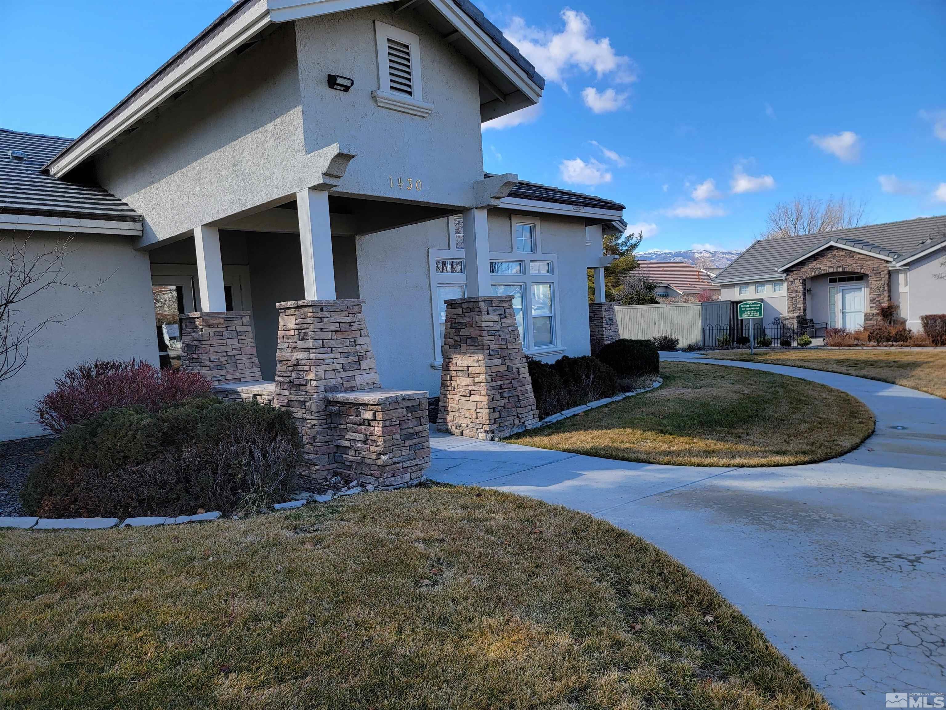 10175 Donner Peak Drive Reno, NV 89521 - Photo 31 of 35 a front view of a house with yard