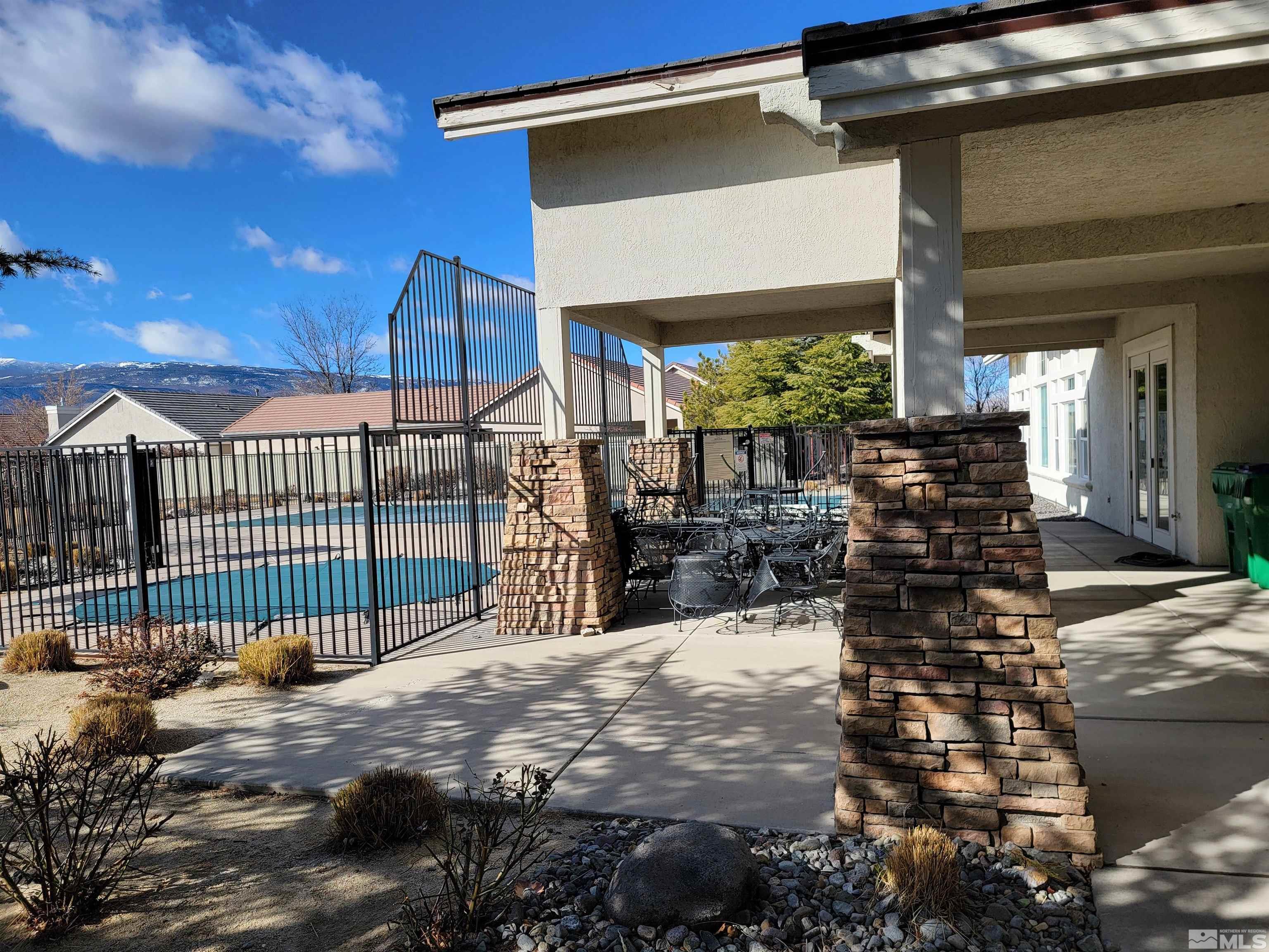 10175 Donner Peak Drive Reno, NV 89521 - Photo 33 of 35 a view of a house with a patio