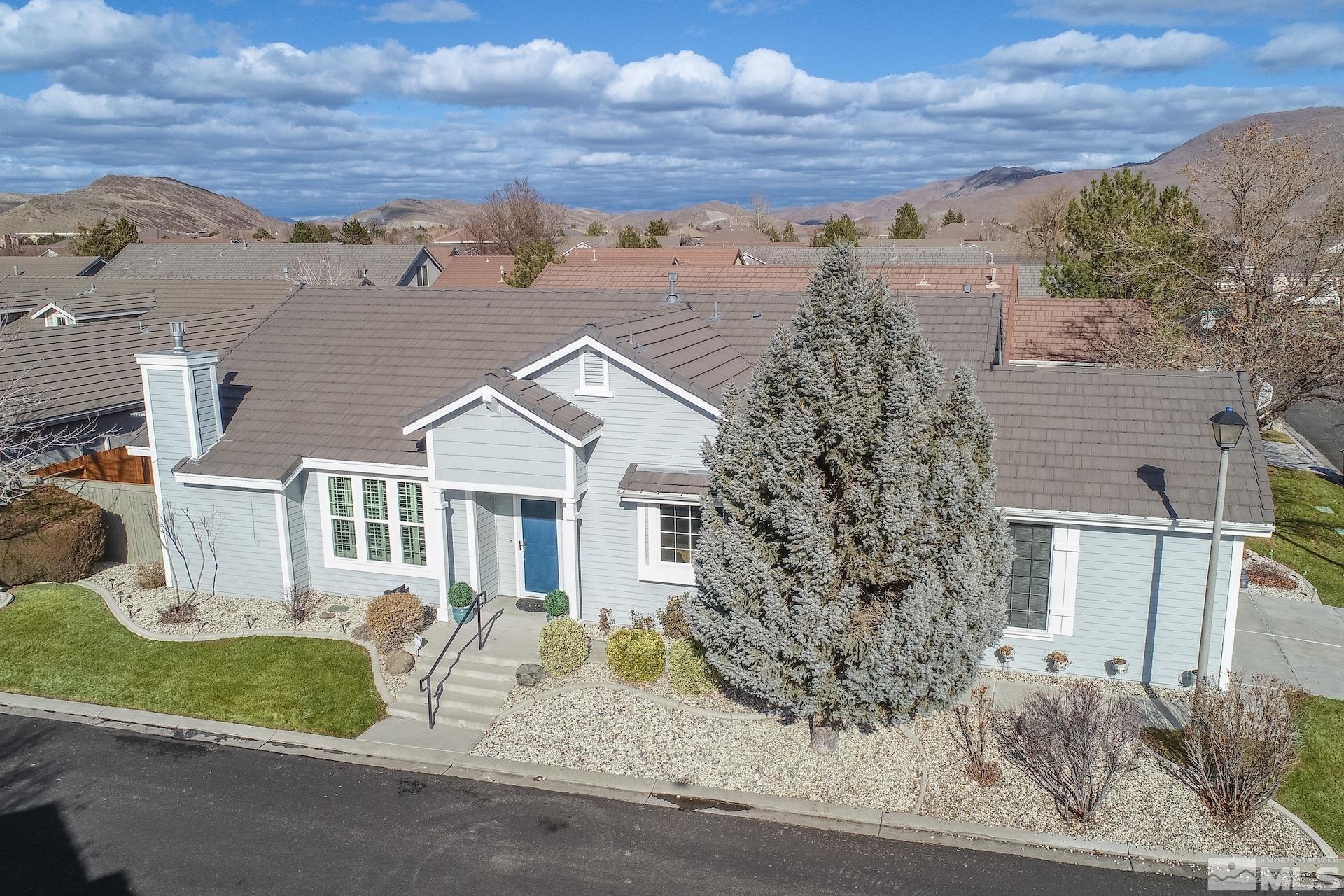 10175 Donner Peak Drive Reno, NV 89521 - Photo 7 of 35 front view of a house with a view of a house