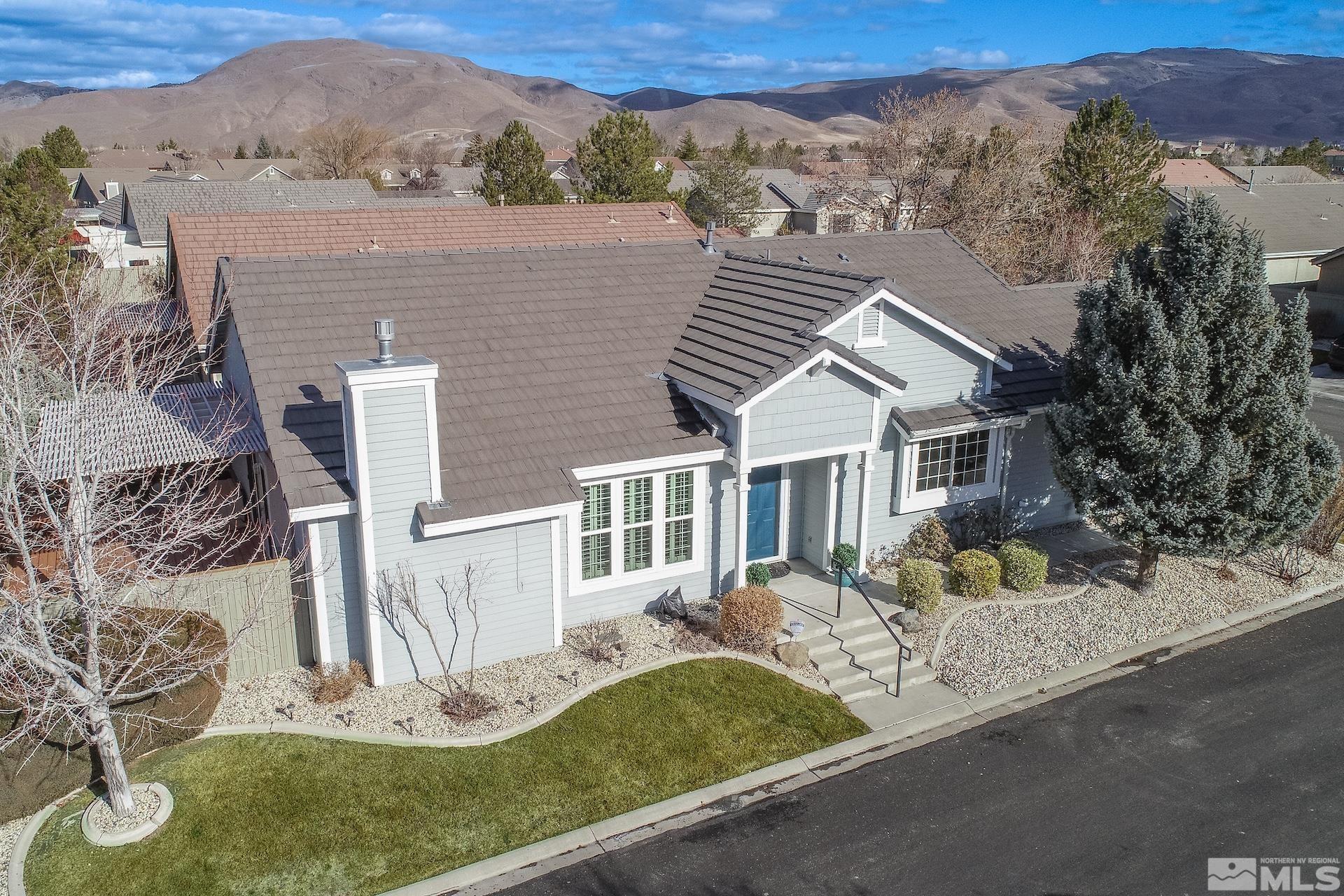 10175 Donner Peak Drive Reno, NV 89521 - Photo 8 of 35 an aerial view of a house with a yard