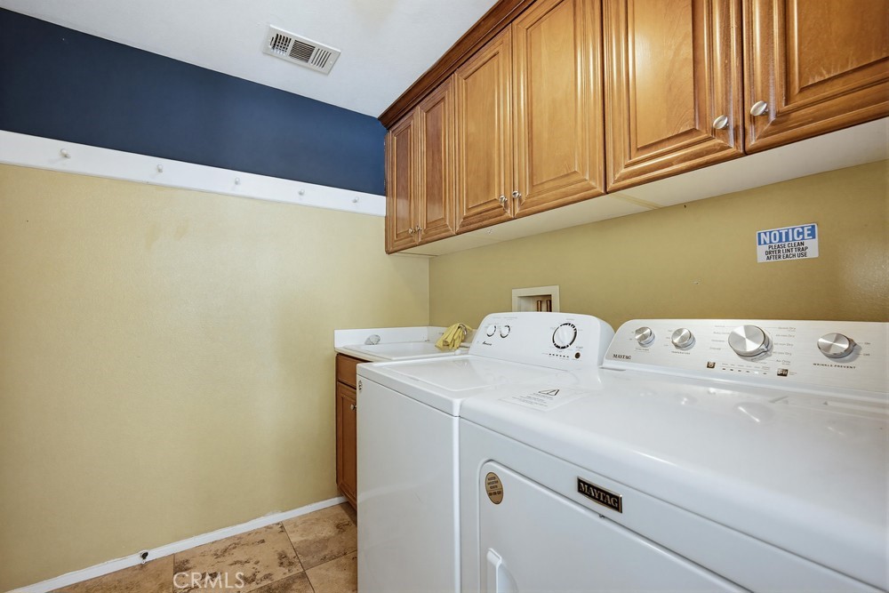 1747 Palermo Drive Riverside, CA 92507 - Photo 13 of 30 a utility room with dryer and washer