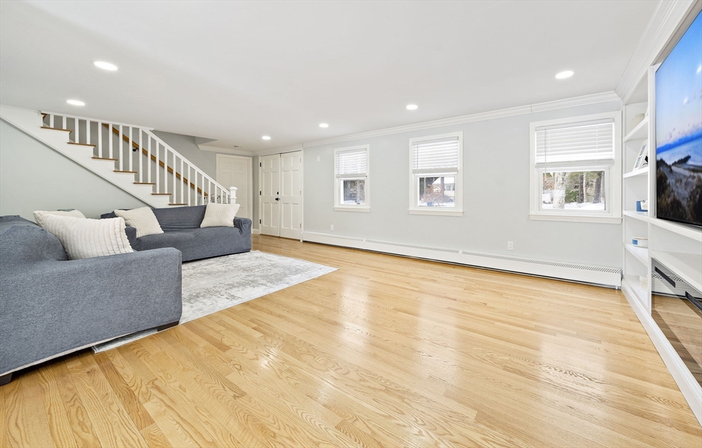 10 Dowd Avenue Wareham, MA 02571 - Photo 13 of 42 a living room with furniture and a flat screen tv