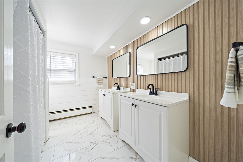 10 Dowd Avenue Wareham, MA 02571 - Photo 19 of 42 a view of a sink and a mirror