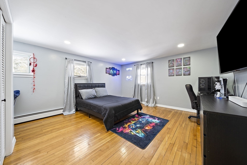 10 Dowd Avenue Wareham, MA 02571 - Photo 25 of 42 a living room with furniture and a flat screen tv