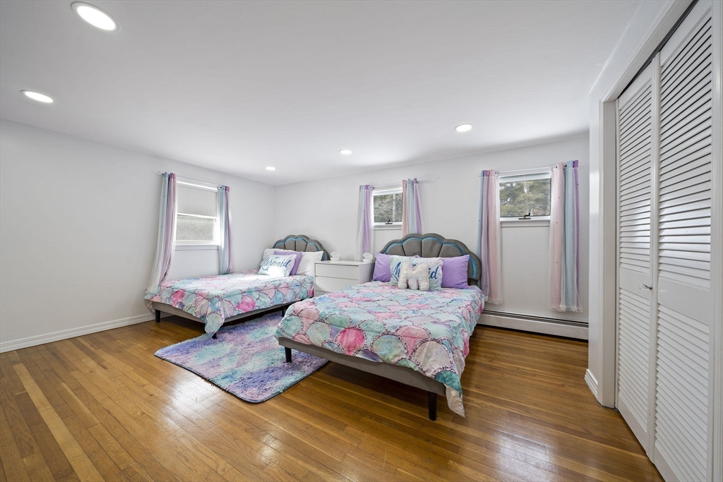 10 Dowd Avenue Wareham, MA 02571 - Photo 28 of 42 a bedroom with furniture and a wooden floor
