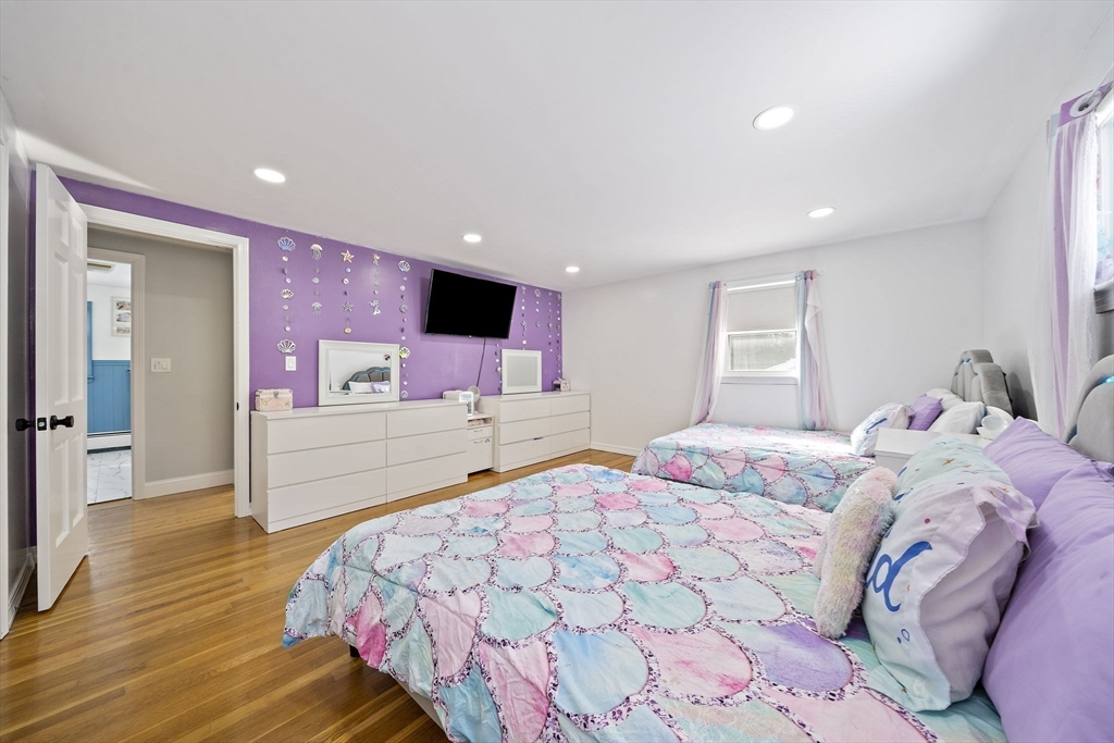 10 Dowd Avenue Wareham, MA 02571 - Photo 29 of 42 a bedroom with a bed and a flat screen tv