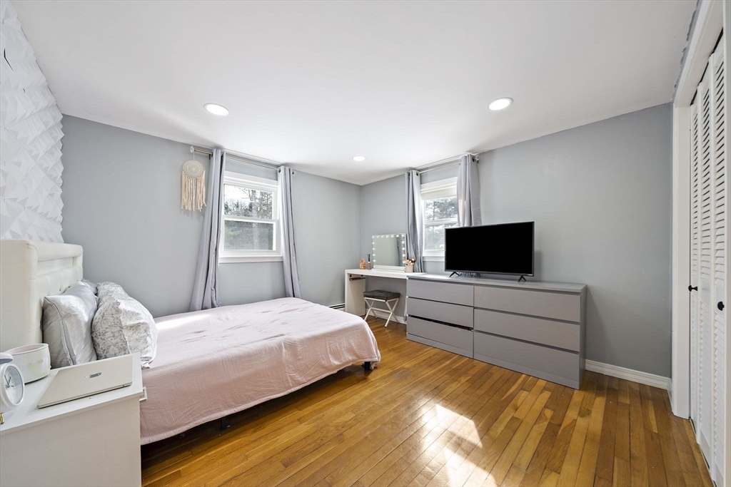 10 Dowd Avenue Wareham, MA 02571 - Photo 31 of 42 a bedroom with a bed and a flat screen tv