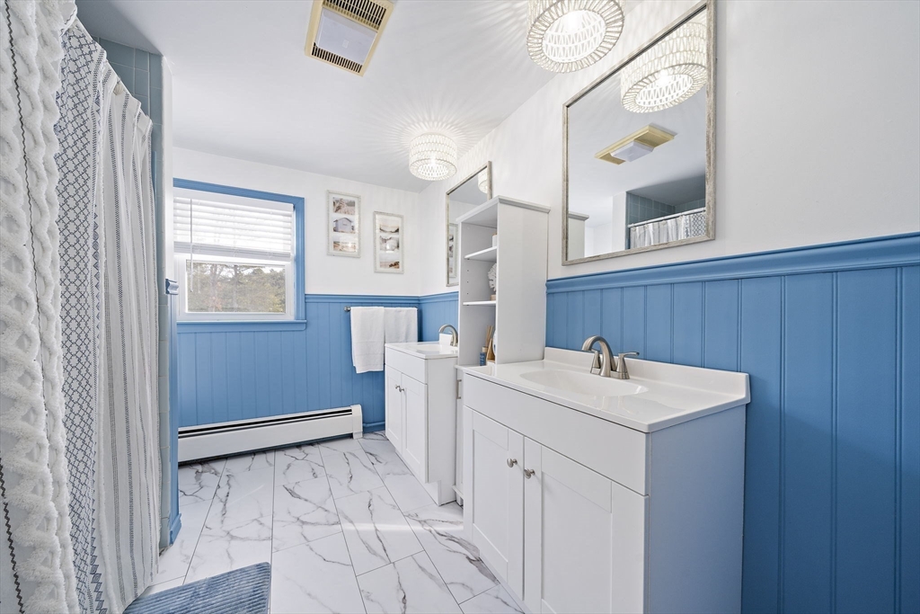 10 Dowd Avenue Wareham, MA 02571 - Photo 33 of 42 a view of hallway with washer and dryer