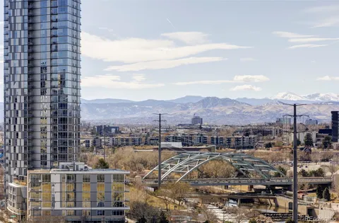 a view of a city with tall buildings