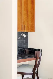 a workspace with furniture and window