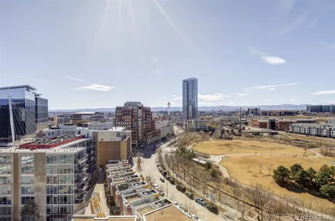 a view of a swimming pool with outdoor seating and yard