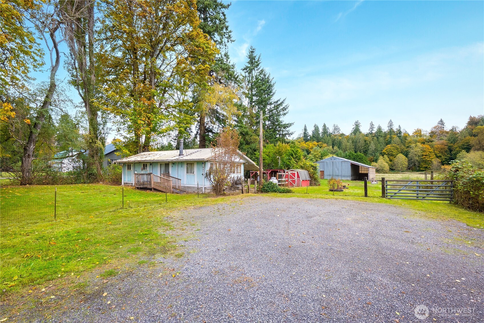 921 Russell Road Snohomish, WA 98290 - Photo 6 of 15 a view of a house with pool and a yard