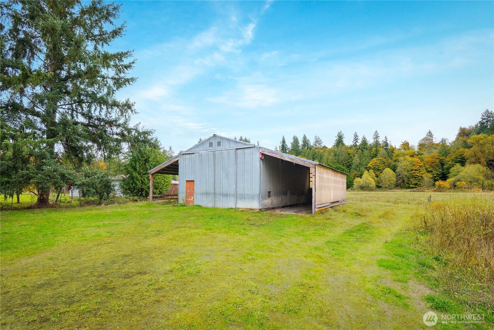921 Russell Road Snohomish, WA 98290 - Photo 8 of 15 a view of a house with a big yard