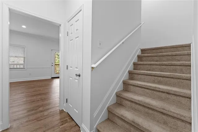 a view of entryway with wooden floor