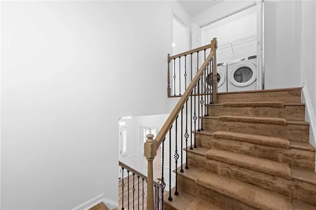 a view of entryway with wooden floor