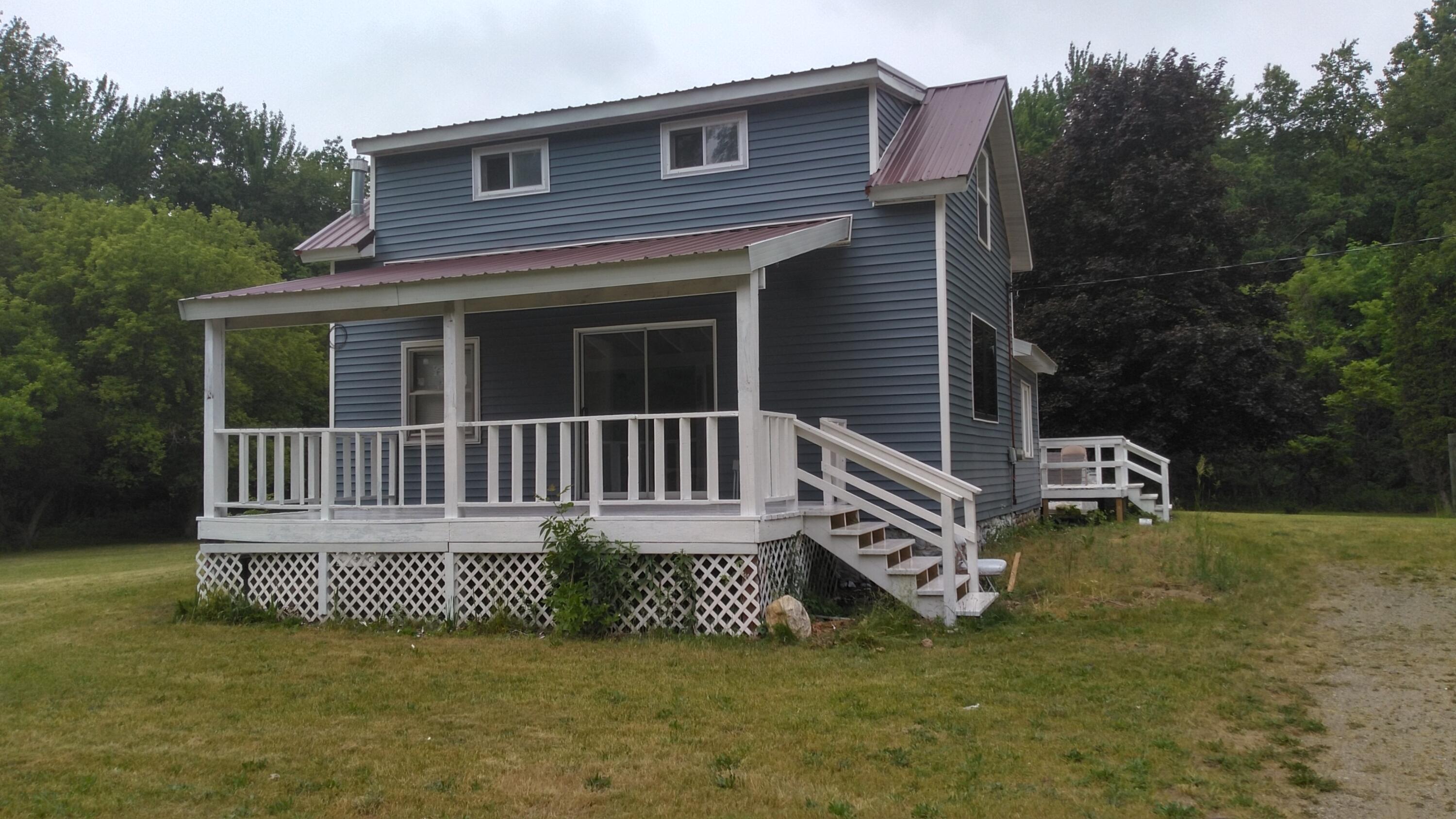 16980 Bailey Road Bailey, MI 49303 - Photo 1 of 14 Front View