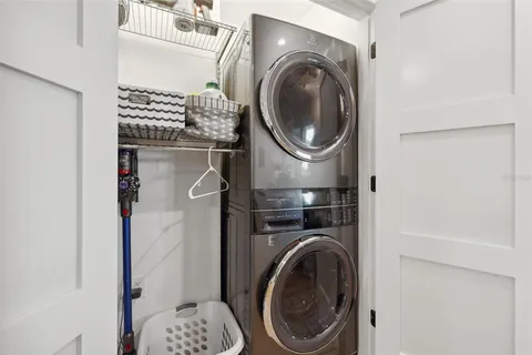 a view of a swimming pool with a lounge chairs