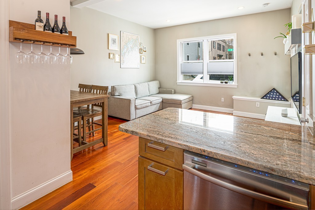 295 D Street, Unit 1 Boston, MA 02127 - Photo 2 of 13 a view of a living room and dining room