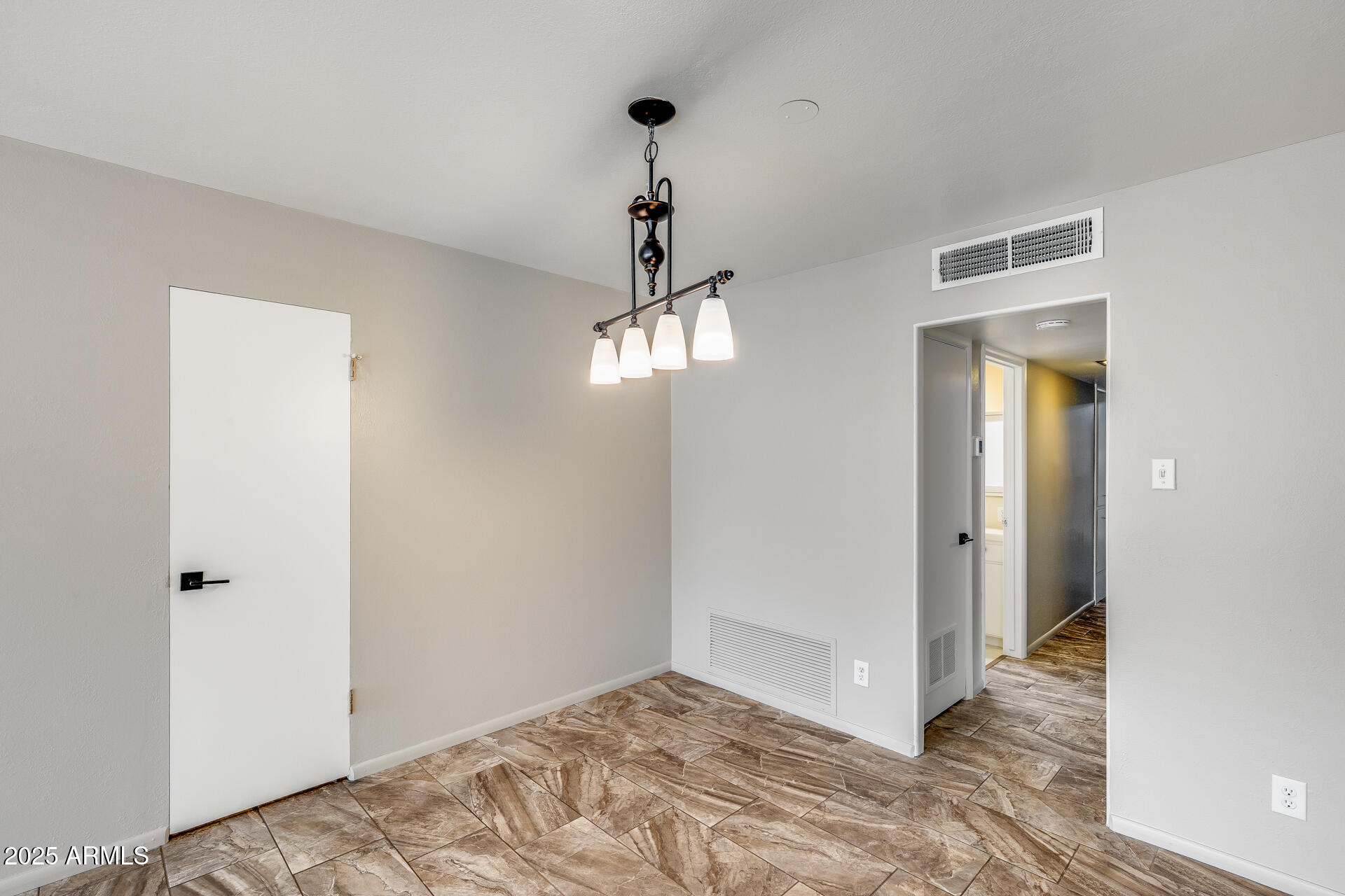146 East Coronado Road, Unit 40 Phoenix, AZ 85004 - Photo 12 of 39 a view of empty room with wooden floor