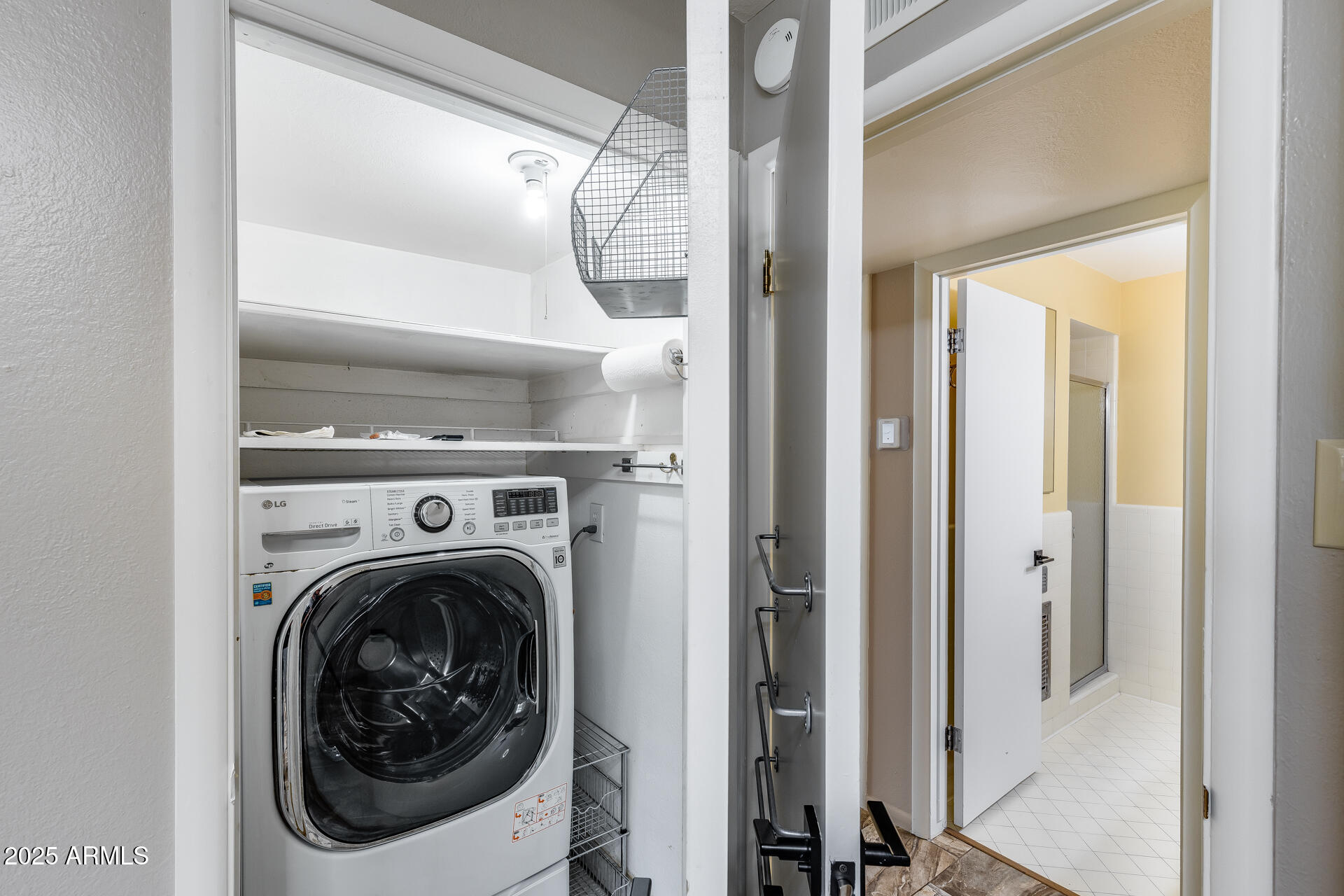 146 East Coronado Road, Unit 40 Phoenix, AZ 85004 - Photo 22 of 39 a view of a hallway with washer and dryer