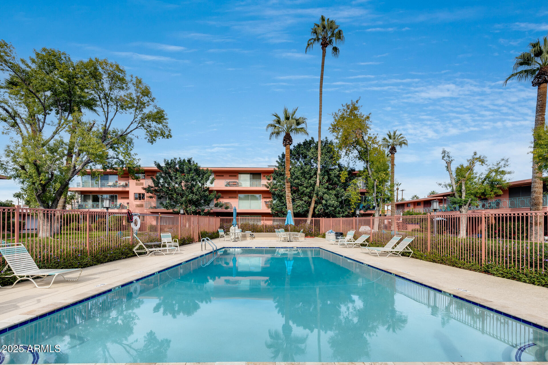 146 East Coronado Road, Unit 40 Phoenix, AZ 85004 - Photo 3 of 39 a view of a swimming pool and a lake view