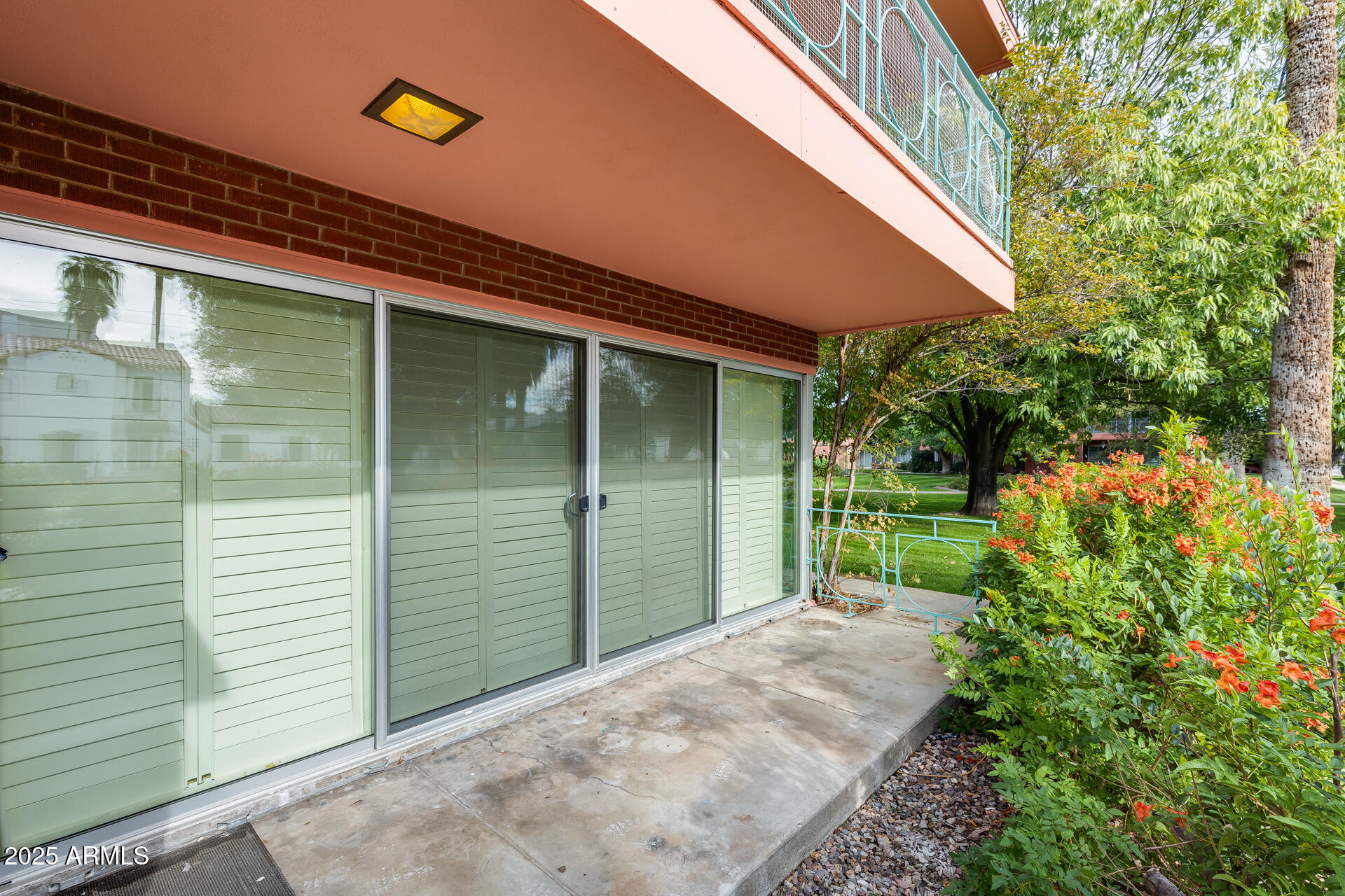 146 East Coronado Road, Unit 40 Phoenix, AZ 85004 - Photo 6 of 39 a backyard of a house with plants and tree