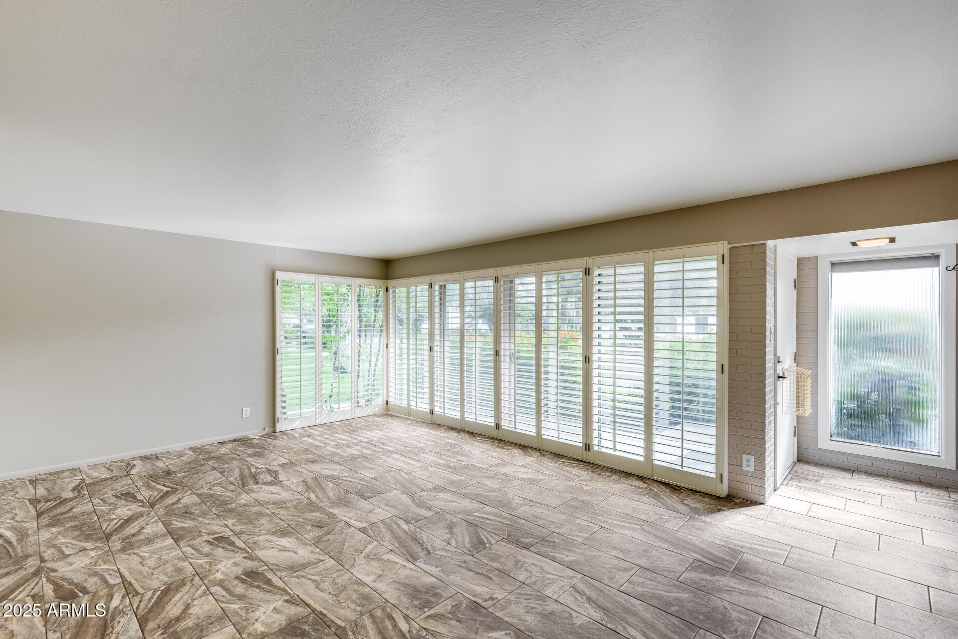 146 East Coronado Road, Unit 40 Phoenix, AZ 85004 - Photo 9 of 39 a view of an empty room with a balcony