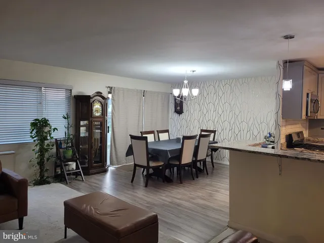 a view of a dining room with furniture