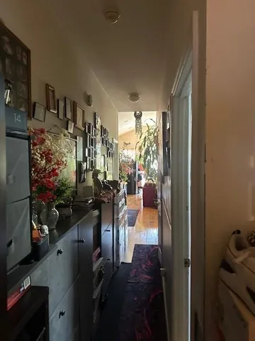 a view of a living room and dining room