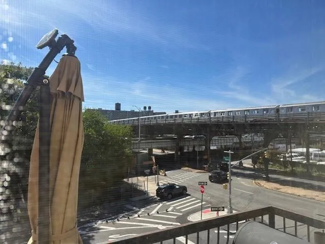 a view of a balcony with an outdoor space