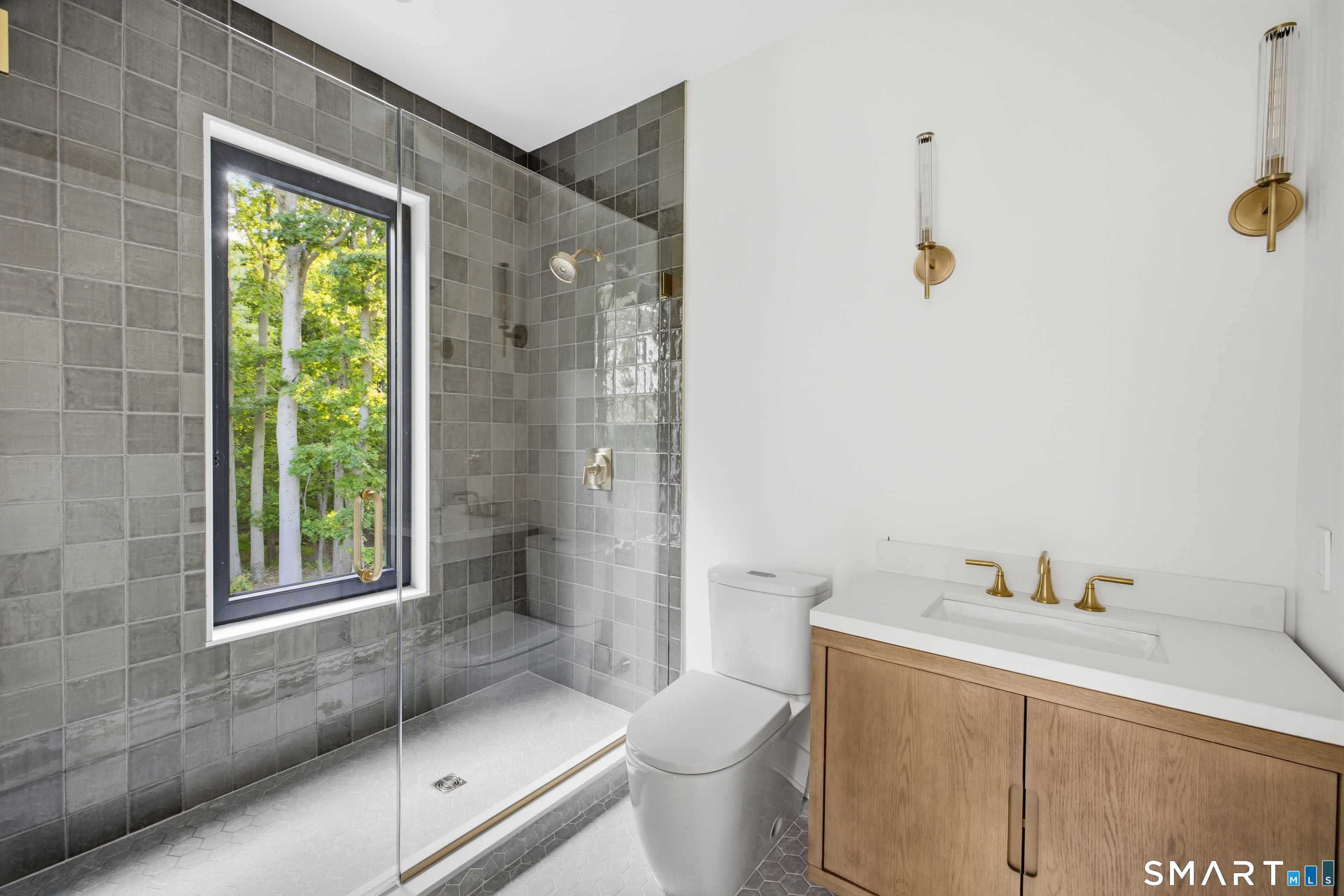 2 Windy Hill Road Westport, CT 06880 - Photo 26 of 40 a bathroom with a sink and a shower