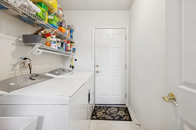 a bathroom with a sink toilet and mirror