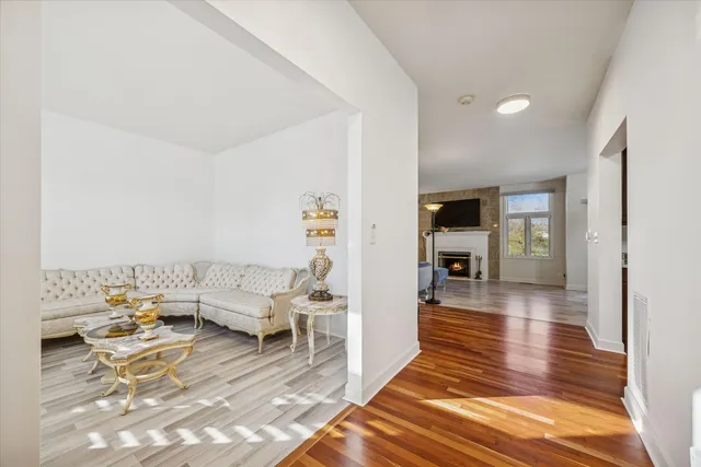 a living room with furniture and view of living room