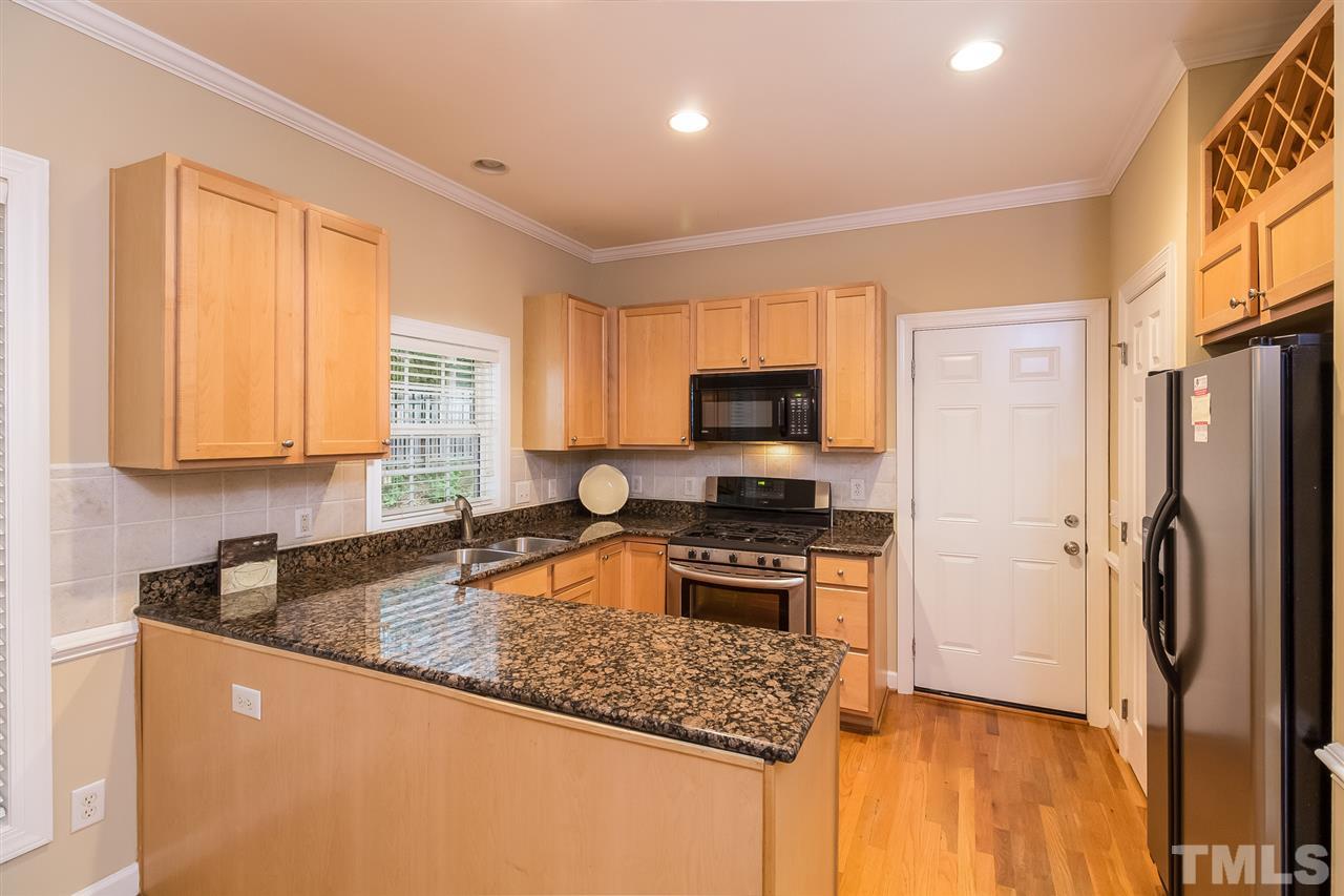 8425 Summersprings Lane Raleigh, NC 27615 - Photo 7 of 25 Granite counter tops, SS appliances
