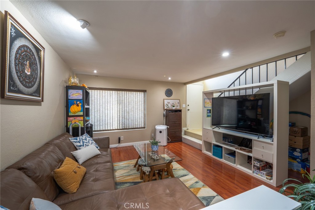 45 Oval Irvine, CA 92604 - Photo 2 of 40 a living room with furniture and a flat screen tv