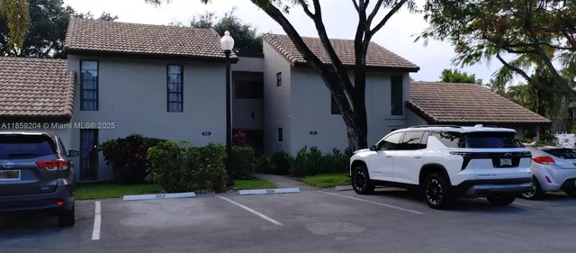 a car parked in front of a house