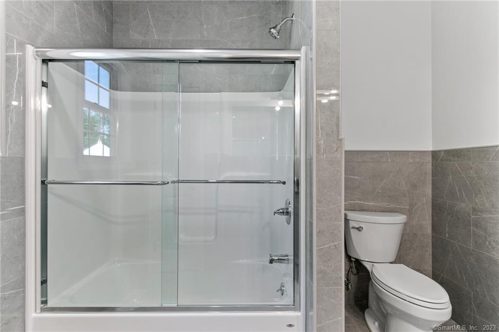 18 A Talcott Ridge Drive Middletown, CT 06457 - Photo 20 of 32 a bathroom with a toilet and a shower