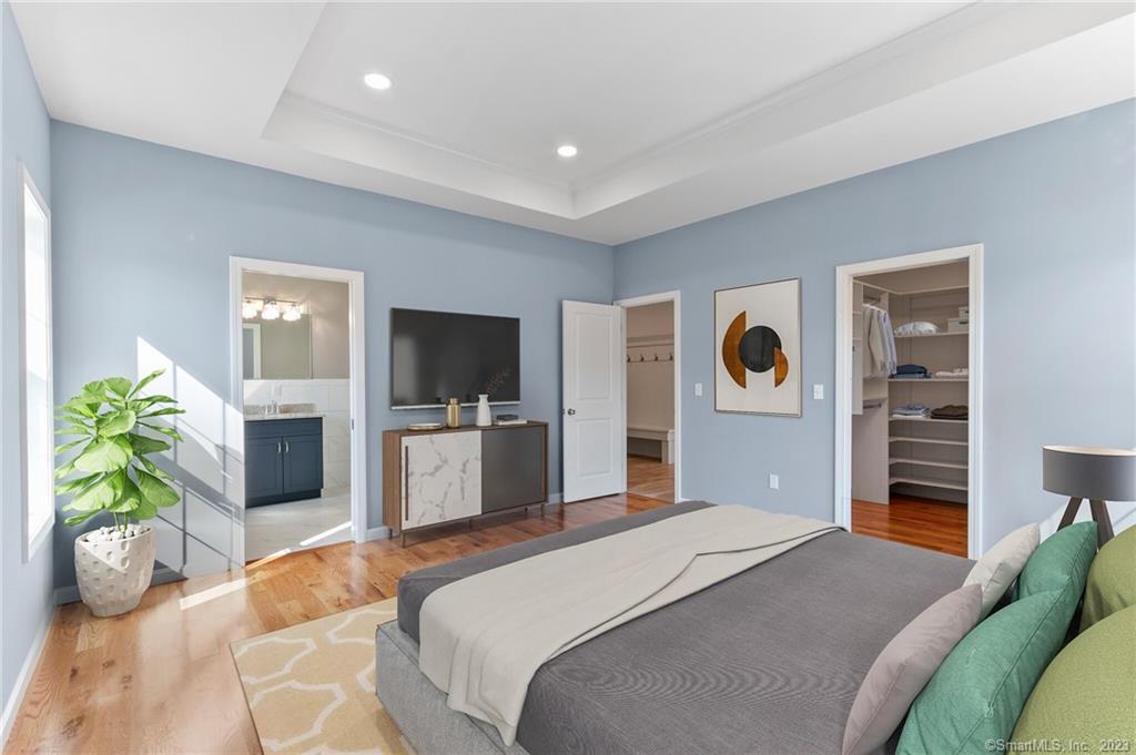 18 A Talcott Ridge Drive Middletown, CT 06457 - Photo 24 of 32 a bedroom with a bed and a television