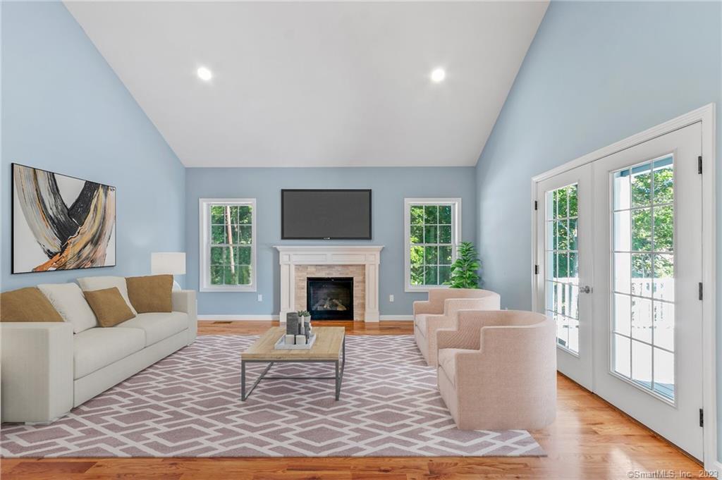 18 A Talcott Ridge Drive Middletown, CT 06457 - Photo 4 of 32 a living room with furniture and a fireplace