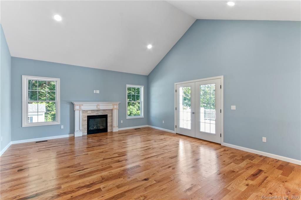 18 A Talcott Ridge Drive Middletown, CT 06457 - Photo 5 of 32 a view of empty room with wooden floor and a window