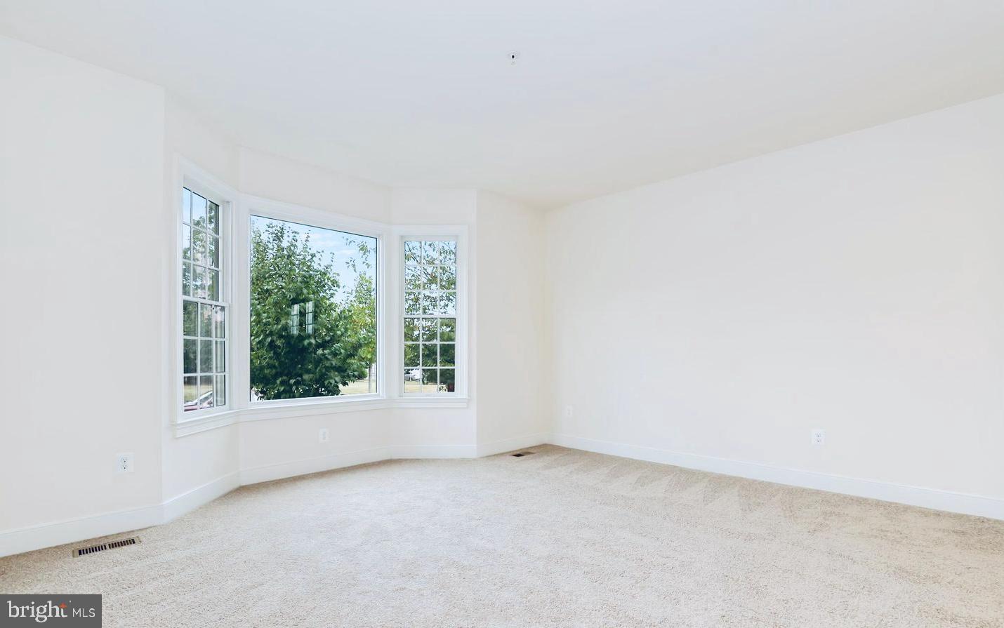 3937 Addison Woods Road Frederick, MD 21704 - Photo 8 of 13 an empty room with a window