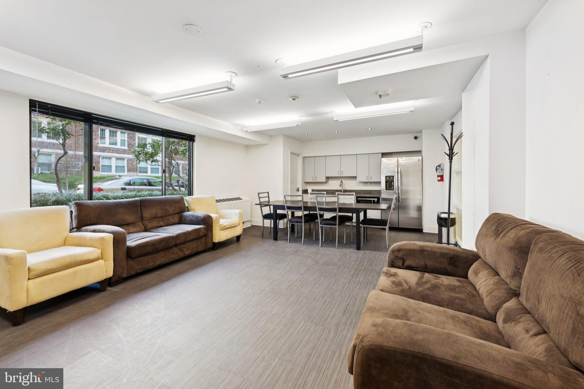 5410 Connecticut Avenue Northwest, Unit 315 Washington, DC 20015 - Photo 20 of 22 a living room with furniture and a large window
