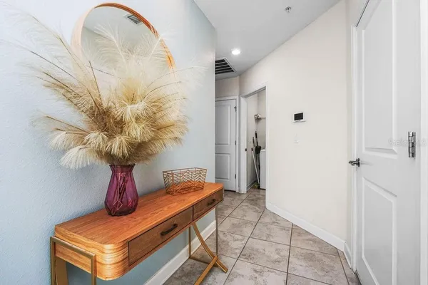 a vase of flowers sitting on a table