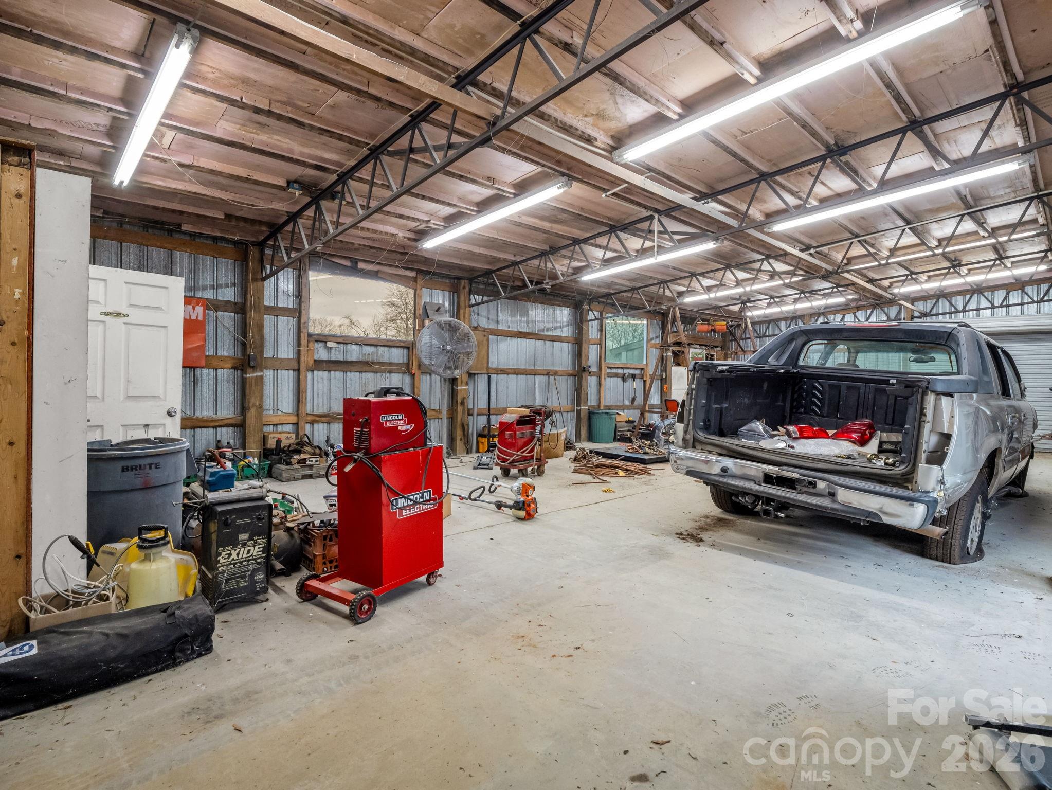 827 Old Henrietta Road Forest City, NC 28043 - Photo 11 of 22 a view of parking garage with cars